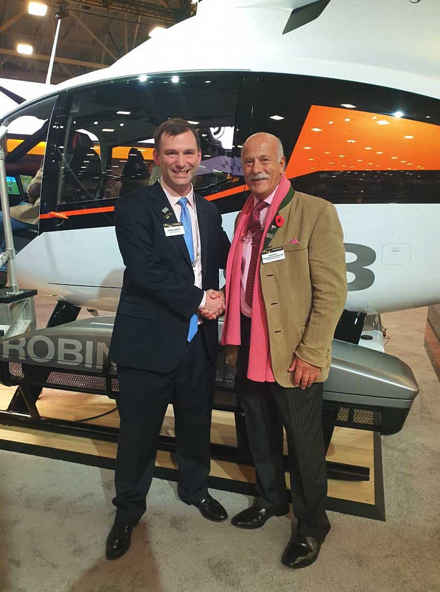 David Smith (President & CEO of Robinson Helicoter Company) and Richard Mornington-Sanford